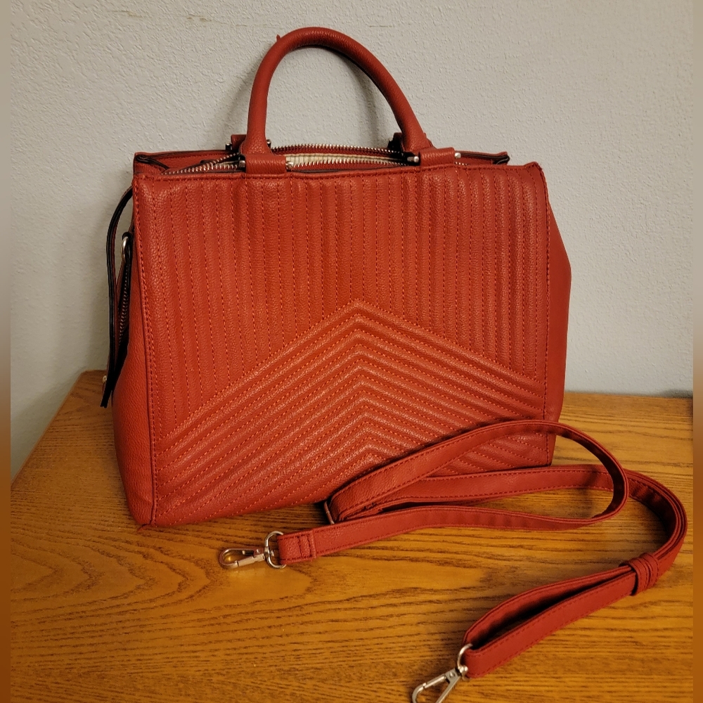 Red hand bag with silver accents
